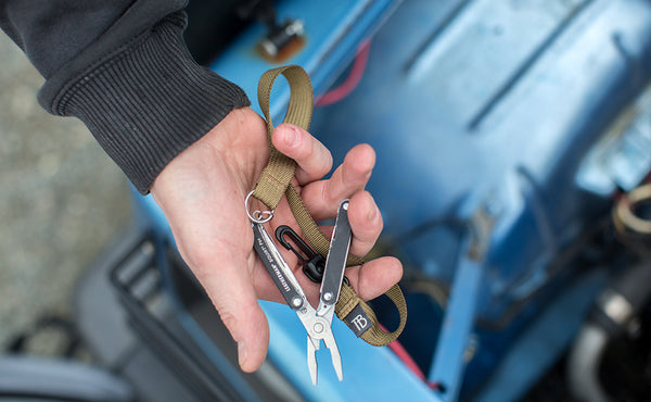 A 16-inch Key Strap with a split-ring o-ring attached to a multitool.